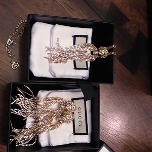Gold Gucci tiger necklace and earrings